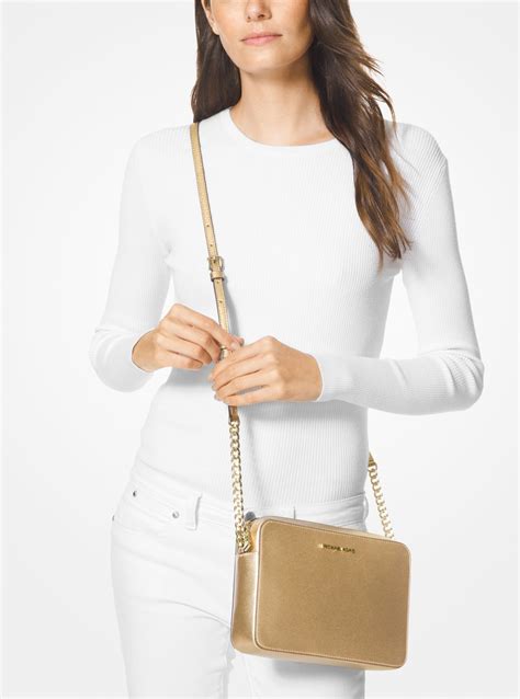 michael kors jet set travel large metallic leather smartphone crossbody|Michael Kors jet set collection.